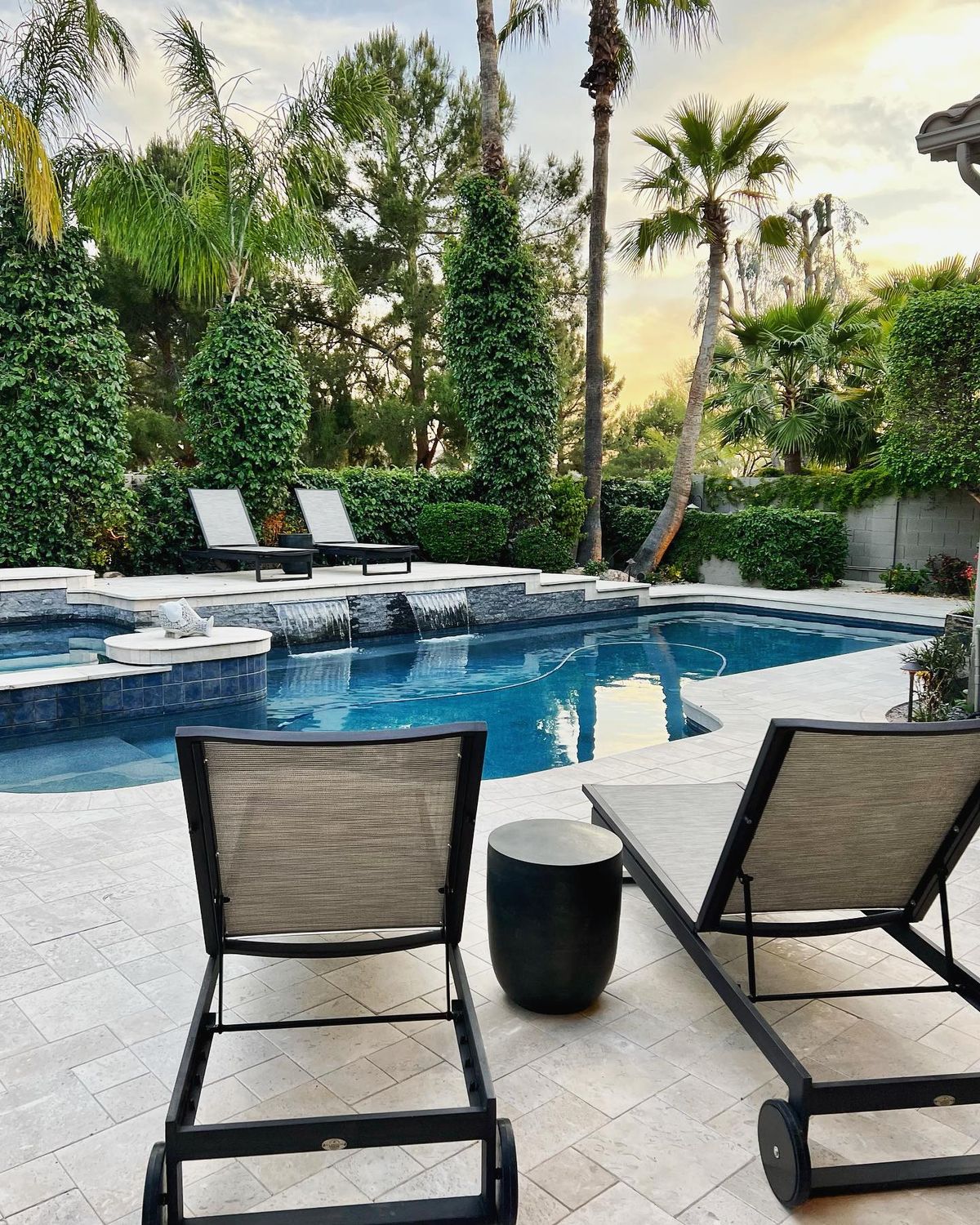 Palm-lined pool with sling chaises, Scottsdale